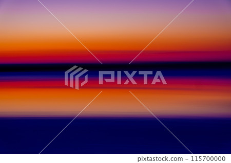 Colorful abstract sunset over sea with vibrant hues 115700000