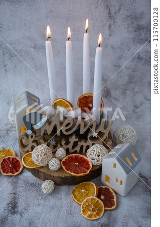 Traditional four advent weeks calendar before Christmas holidays. Candles and plastic free zero waste sustainable decoration. Copy space greeting card mock up template. Winter cozy 115700128