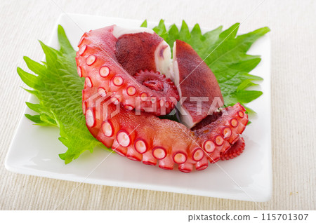 Deliciously boiled octopus legs 115701307