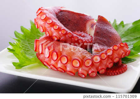 Deliciously boiled octopus legs Deliciously boiled octopus legs 115701309