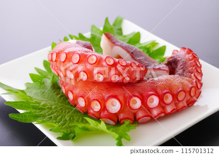 Deliciously boiled octopus legs Deliciously boiled octopus legs 115701312