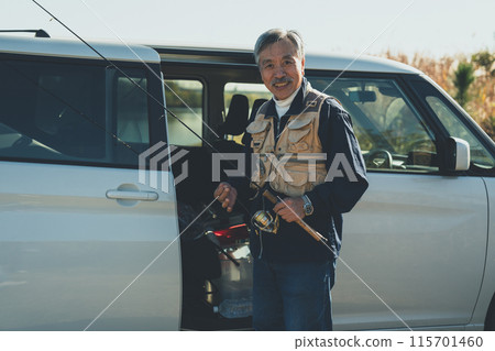 Seniors going out for river fishing by car Seniors going out for river fishing by car 115701460