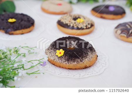 donuts with delicious layers as a background donuts with delicious layers as a background 115702640
