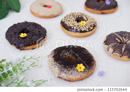 donuts with delicious layers as a background donuts with delicious layers as a background 115702644