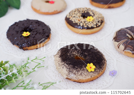 donuts with delicious layers as a background donuts with delicious layers as a background 115702645