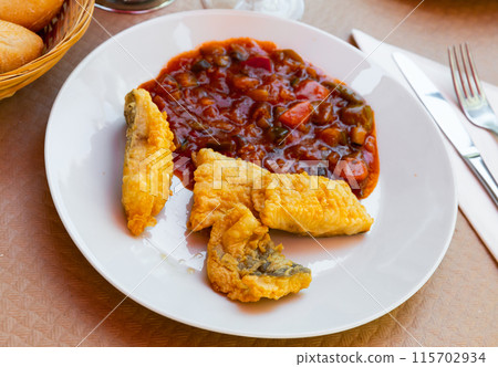 Cod fish served with ratatouille Cod fish served with ratatouille 115702934