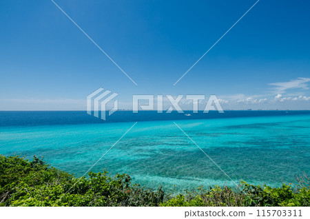Scenic view of the caribbean sea from Isla Mujeres cliff Scenic view of the caribbean sea from Isla Mujeres cliff 115703311