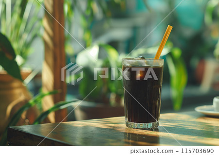 Delicious iced coffee in a lovely green cafe 115703690