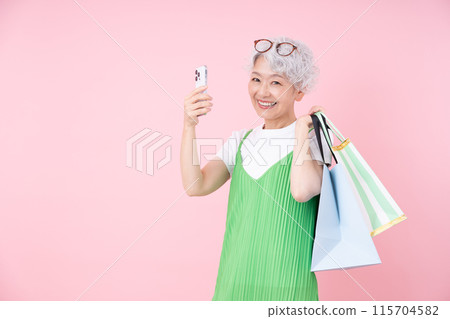 Senior woman shopping 115704582