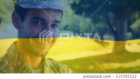 Image of flag of ukraine over happy biracial male soldier 115705122