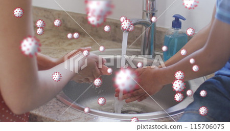 Image of coronavirus cells over caucasian mother with son washing hands at home Image of coronavirus cells over caucasian mother with son washing hands at home 115706075