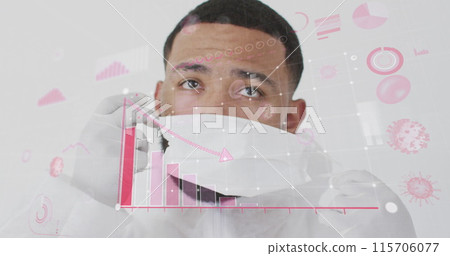 Image of coronavirus cells and diagrams over biracial male doctor wearing face mask Image of coronavirus cells and diagrams over biracial male doctor wearing face mask 115706077