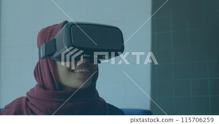 Image of 6g text, scopes scanning and data processing over woman in hijab wearing vr headset 115706259