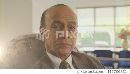 Image of glowing light over serious senior man at home Image of glowing light over serious senior man at home 115706281