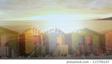 Image of glowing light over smiling senior man carrying surfboard 115706287