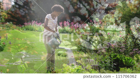 Composite image of tall trees against african american woman watering plants in the garden 115706362