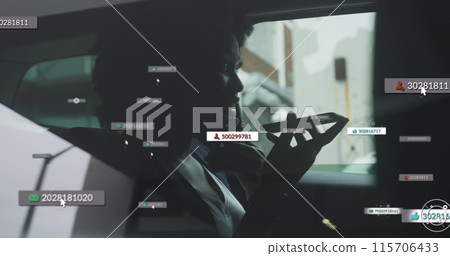 Image of social media notifications over african american woman in face mask using phone in car 115706433