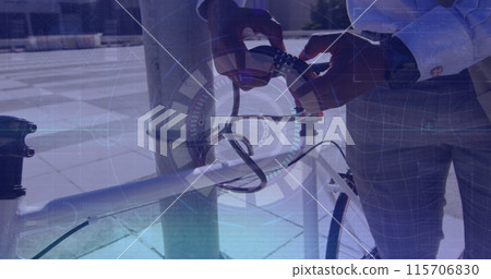 Image of data processing over african american businessman locking bike with lock chain 115706830