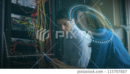 Caucasian woman and young man examine complex wiring on a transparent screen 115707887