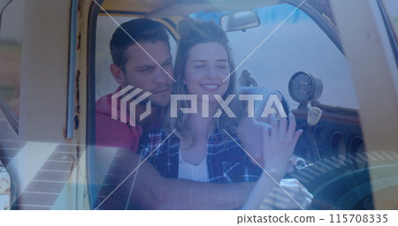 Image of digital data processing over two caucasian people in car Image of digital data processing over two caucasian people in car 115708335