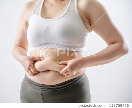 A woman with metabolic syndrome pinches her belly fat, Generative AI AI image 115709726