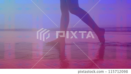 Pink square design pattern against low section of a woman walking on the beach Pink square design pattern against low section of a woman walking on the beach 115712098