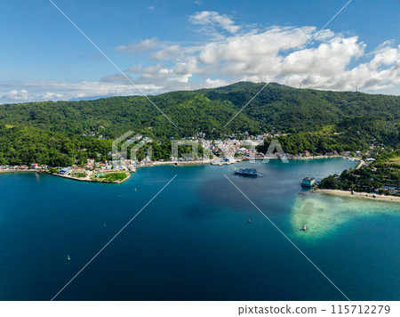 Modern buildings in town city at coastline in Romblon Island. Romblon, Philippines. 115712279