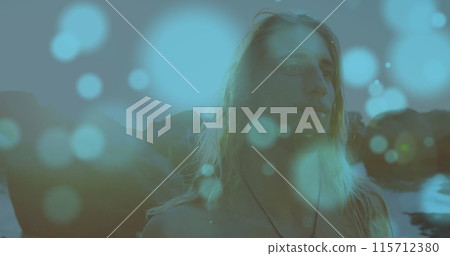 Image of globe of connections over woman with phone headsets Image of globe of connections over woman with phone headsets 115712380
