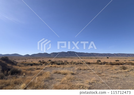 Distant Mountains in the Australian Outback Distant Mountains in the Australian Outback 115712473