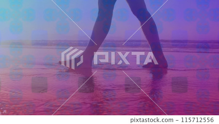 Pink square design pattern against low section of a woman walking on the beach Pink square design pattern against low section of a woman walking on the beach 115712556