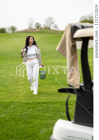 Sporty player enjoying the game on the green lawn 115713824