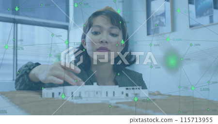 Image of network of connections over asian businesswoman working at office 115713955