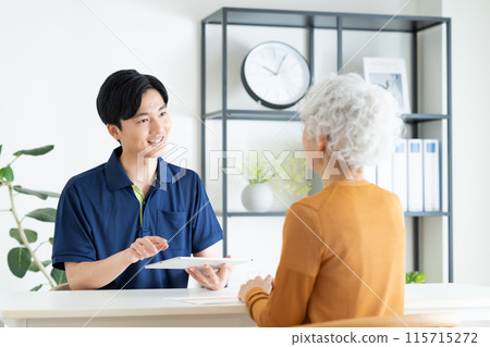 Care manager explaining care plan to senior woman Care manager explaining care plan to senior woman 115715272