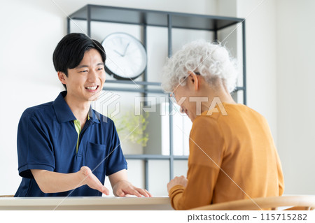 Care manager explaining care plan to senior woman Care manager explaining care plan to senior woman 115715282