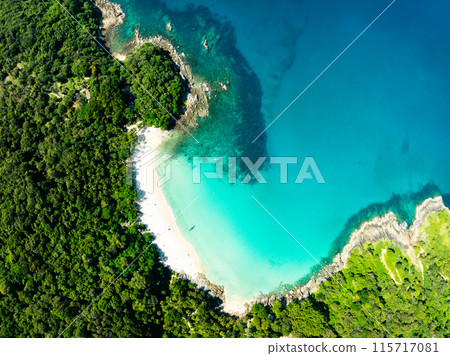Aerial view Top down seashore background,Waves crashing on rock cliff, Beautiful dark sea surface in sunny day summer background, Amazing seascape top view seacoast at Phuket beach Thailand 115717081