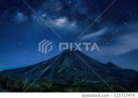 Generative ai on theme of mountain range with visible silhouettes through the morning colorful fog Generative ai on theme of mountain range with visible silhouettes through the morning colorful fog 115717479