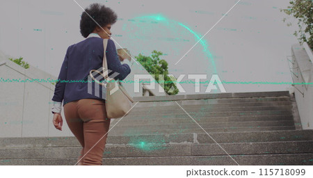 Image of globe and business data over african american woman using smartphone Image of globe and business data over african american woman using smartphone 115718099