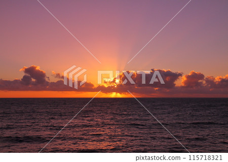 A view of the Indian Ocean sunrise and sunset from the coast of Saint-Denis, the capital of the French overseas department of Reunion A view of the Indian Ocean sunrise and sunset from the coast of Saint-Denis, the capital of the French overseas department of Reunion 115718321
