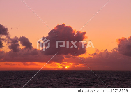 A view of the Indian Ocean sunrise and sunset from the coast of Saint-Denis, the capital of the French overseas department of Reunion 115718339