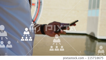 Image of user icons over hands of biracial man using smartphone in city Image of user icons over hands of biracial man using smartphone in city 115718675