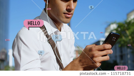 Image of hello and hi over midsection of biracial man using smartphone in city 115718731