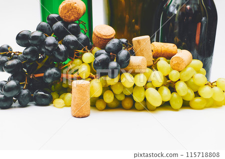 Wine corks,stopper,bottle,grape. Old taste of pleasure Wine corks,stopper,bottle,grape. Old taste of pleasure 115718808