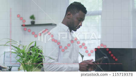 Image of red graph over african american businessman using smartphone in office Image of red graph over african american businessman using smartphone in office 115719378