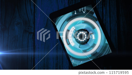 Image of blue circular scanner and processing data on screen of tablet on wooden boards Image of blue circular scanner and processing data on screen of tablet on wooden boards 115719595
