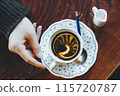 Hand of women who drink coffee 115720787