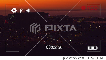 Digital camera records fast-moving night traffic and cityscape in 4k. Digital camera records fast-moving night traffic and cityscape in 4k. 115721161