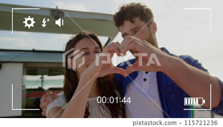 Young couple captured on a digital camera screen in 4k record mode. 115721236