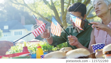 Image of white and red stripes and human silhouette over diverse senior woman and young man Image of white and red stripes and human silhouette over diverse senior woman and young man 115722260