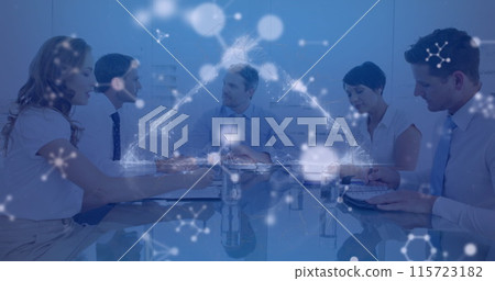 Image of triangle, floating nucleotides over multiracial coworkers discussing in meeting Image of triangle, floating nucleotides over multiracial coworkers discussing in meeting 115723182