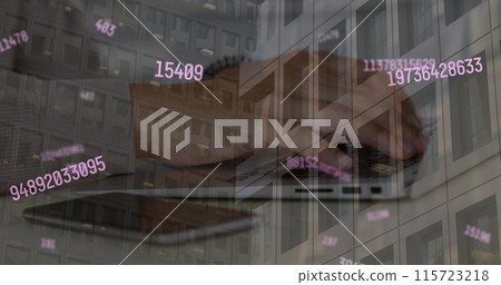 Image of numbers processing over modern office building and caucasian man using laptop 115723218